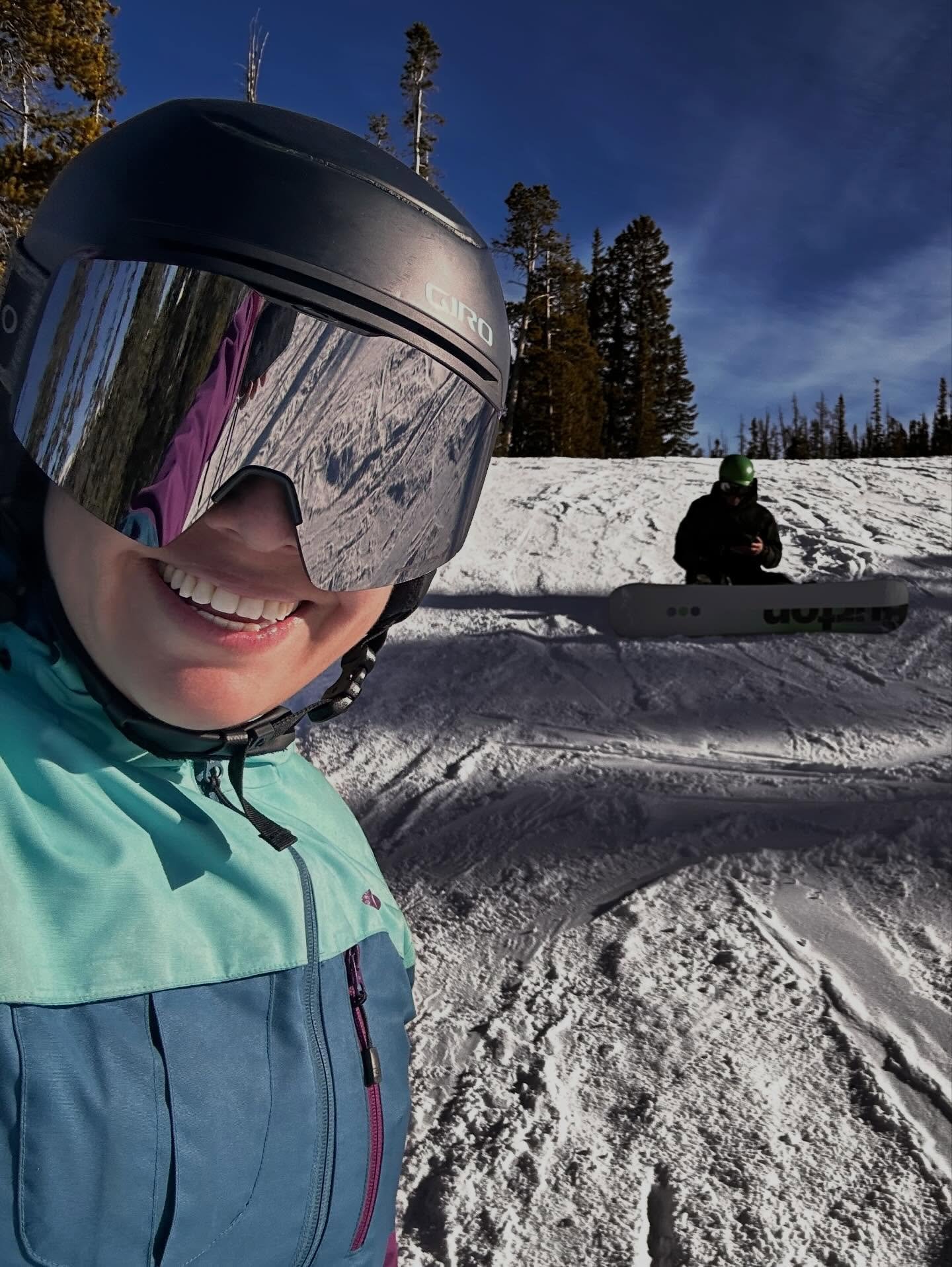 Devin and his son skiing together